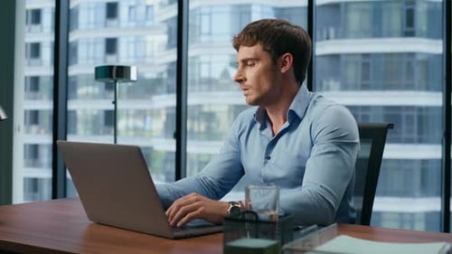 Closeup Nervous Businessman Arguing Smartphone in Office. Aggressive Guy Answering Cellphone Working