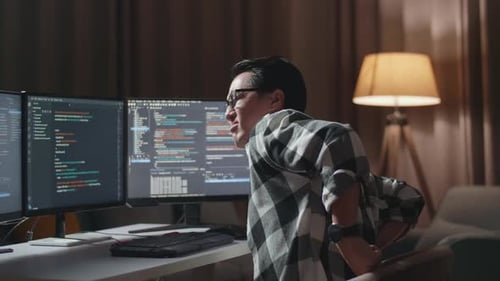 Asian Male Programmer Having A Backache While Creating Software Engineer Developing App, Program