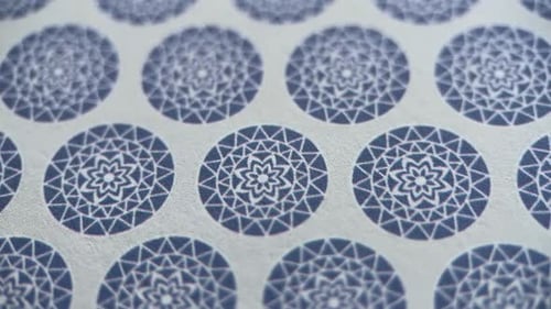 Repeating Geometric Pattern of Blue Designs