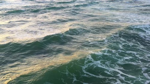 Aerial Top View on Rolling Ocean Waves