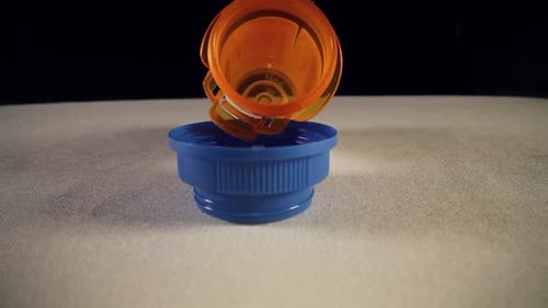 Pills in Prescription Bottle Close Up