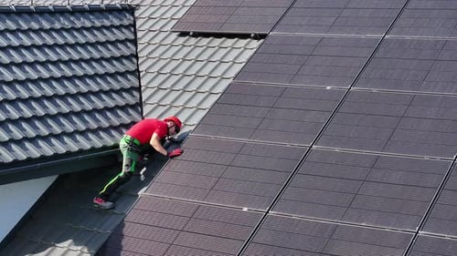 Installing Solar Panels on a House Roof