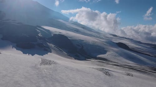 Winter Natural Landscape Mountain Slopes Draped in Snow Serene Beauty Aerial View Mountain Slopes