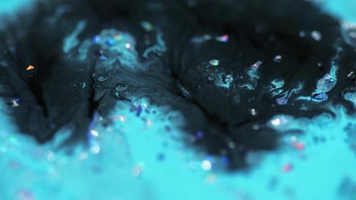Abstract Paint Swirls in Turquoise Liquid with Glitter