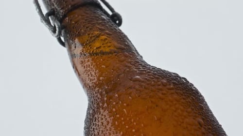 Cold Beer Bottle Condensation in Slow Motion