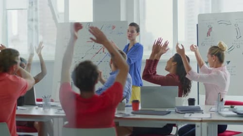 Business Presentation Applauded by Colleagues in Meeting Room