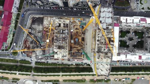 Aerial View the Building Construction. Aerial View Of City Development. Skyscraper Building Process