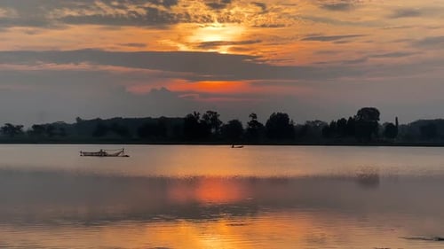 Still Lake Reflects Scenic Sunset