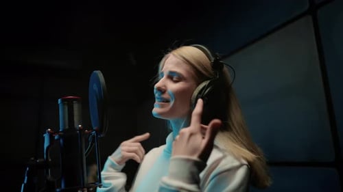 Professional Singer Woman Performing Beautiful Love Ballad in Recording Studio Young Lady Recording