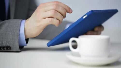 Business, Education, People and Technology Concept - Close Up of Businessman With