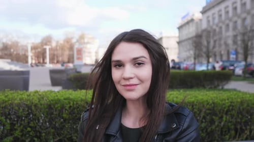 Portrait of a Beautiful Young Woman in the City
