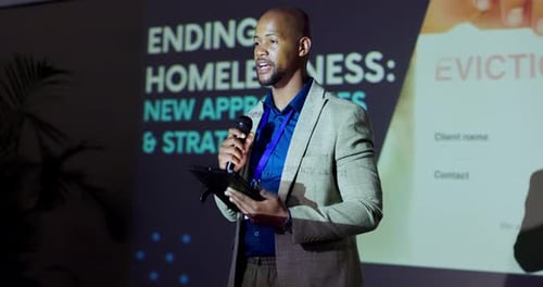 Confident Speaker Presents at a Corporate Conference