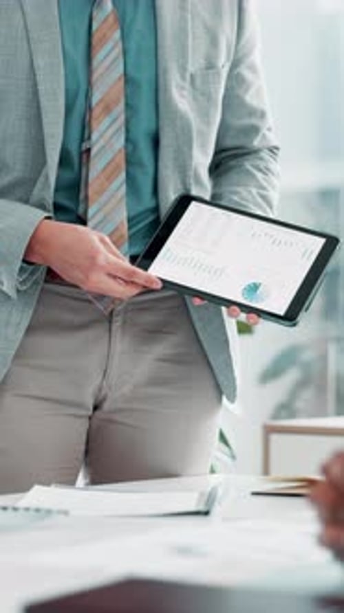 Business Presentation with Tablet in Office Setting