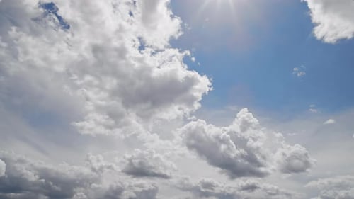 White Clouds Drifting across a Blue Sky