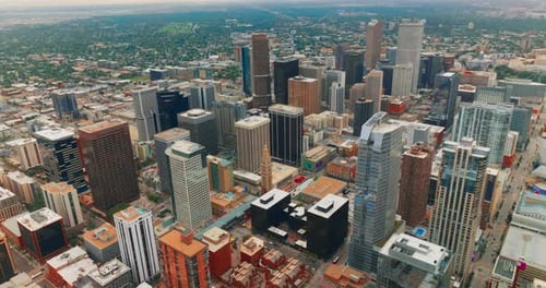 Denver skyscrapers at backdrop of green cityscape. Beautiful city architecture