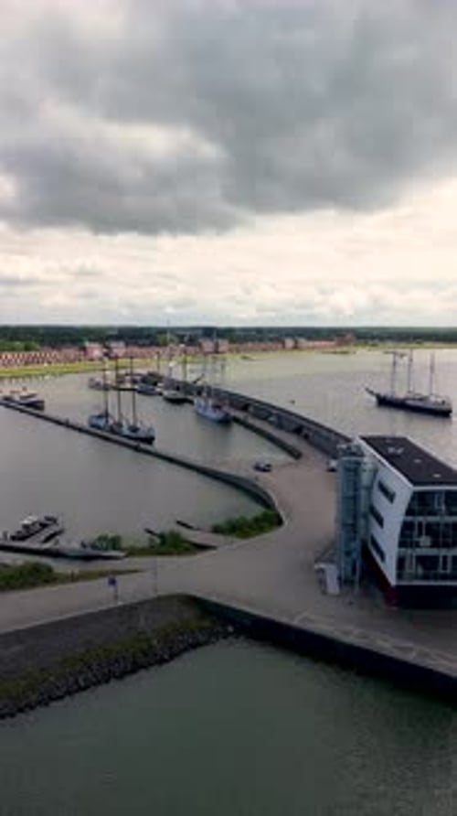 Lelystad, Flevoland, Netherlands - 09.06.2025: Aerial view of a harbor with several boats and ships