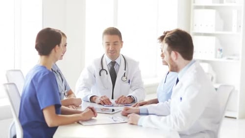 Hospital, Profession, People, Teamwork and Medicine Concept - Group of Happy Doctors