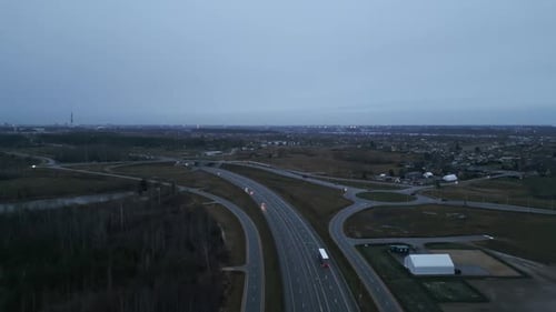 A Breathtaking Aerial View Showcasing Open Roads and a Beautiful Scenic Landscape on a Cloudy