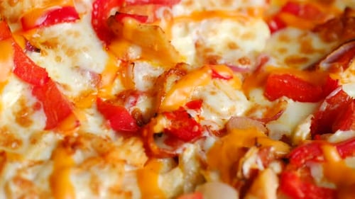 Cheesy Pizza Slice Being Pulled From Pizza