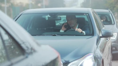 Frustrated Driver Protesting in Congestion Irate Individual Vocally Protesting Amidst Busy City