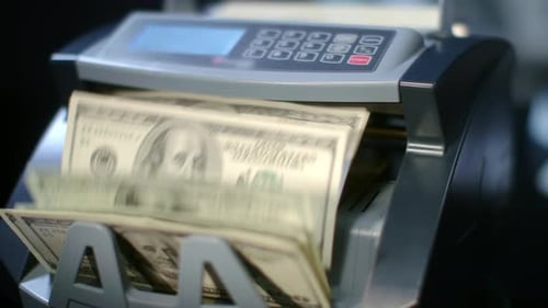 Modern Currency Counting Machine Counting Dollar Bills. Money Counting Equipment. Paper Money