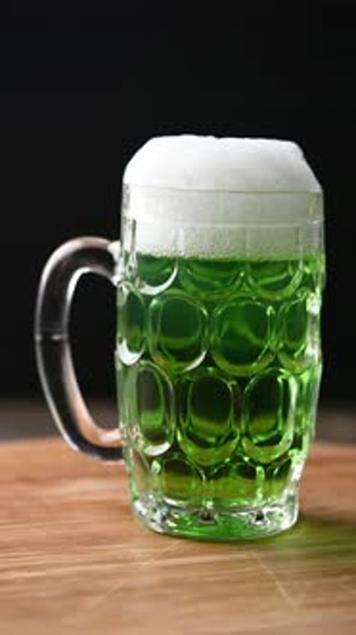 Green beer mug with foam for St. Patrick’s Day