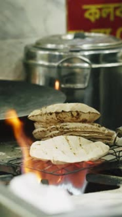 Man Cooking Street Food on