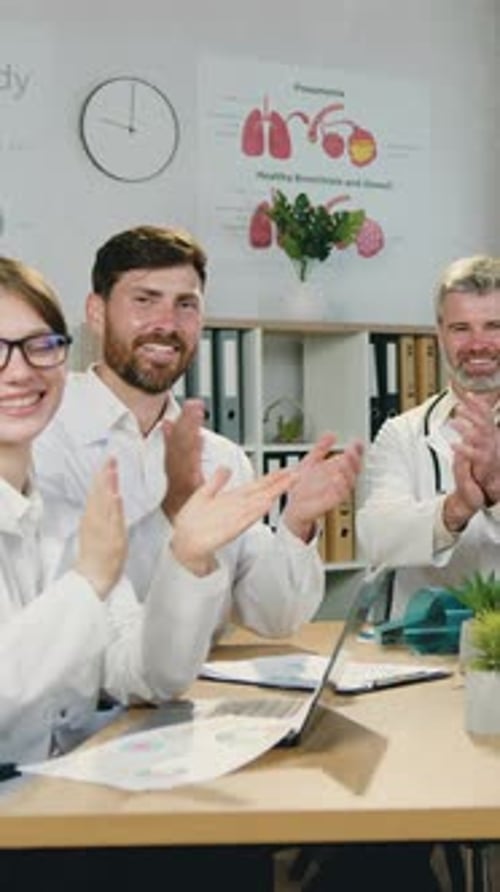 Close Up Portrait of Likable Goodnatured Experienced Successful Multiethnic Medical Workers Which