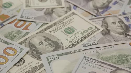 Pile of One Hundred US Dollar Bills