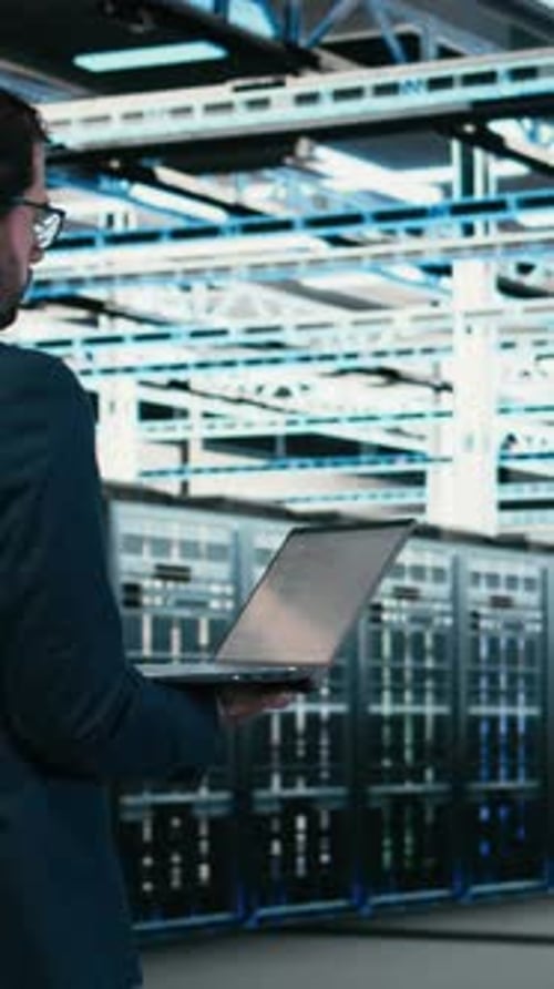 Vertical Video Writing Code Laptop Program and Software Developer in Data Center