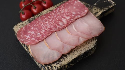 Cold Cut Meats on Wooden Board with Garnish