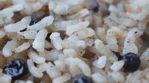 Close Up Shot of Cooked Brown Rice on a Plate