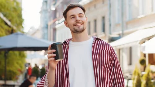 Handsome Adult Man Enjoying Drinking Morning Coffee Hot Drink Relaxing Taking a Break on City Street