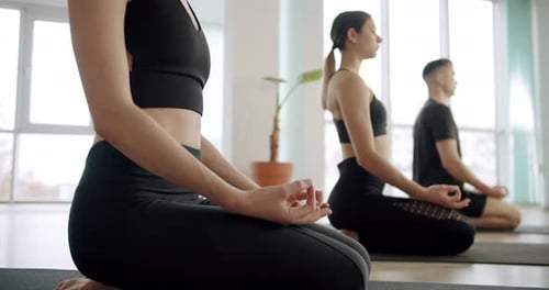 Relaxing After Group Exercises in Class Room Yoga Club Concentration