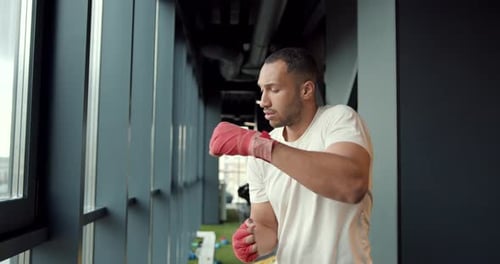 Man Boxing in Gym Workout and Exercise