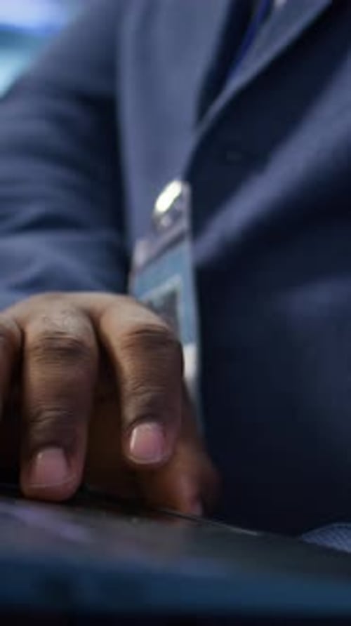 Vertical Video Close Up Shot of Worker Looking for Data Center Network Issues Using Laptop