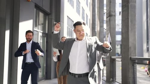 Group of Colleagues Dancing in Celebration