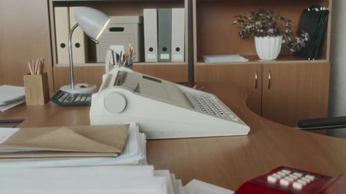Old Vintage Typewriter on Wooden Desk in 90s Office