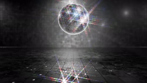 Nostalgic animation. Smooth rotation of disco ball with glare on mirrors.