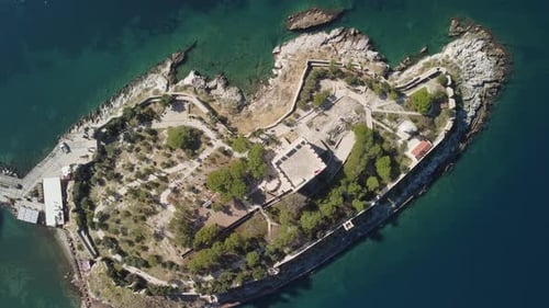 Awesome aerial view of Guvercinada Island with scenic castle