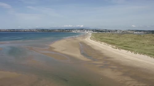 Expansive sandy beach at Tramore Dunes on south coast of Ireland