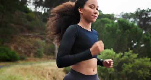 Woman, running and exercise in forest, park and training outdoor in nature with calm workout