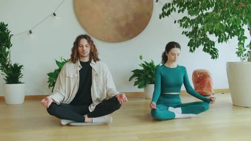Couple Meditating Serene Indoor Setting