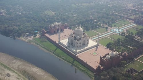 Aerial view of the Taj Mahal along Yamuna river, Agra, Uttar Pradesh, India.