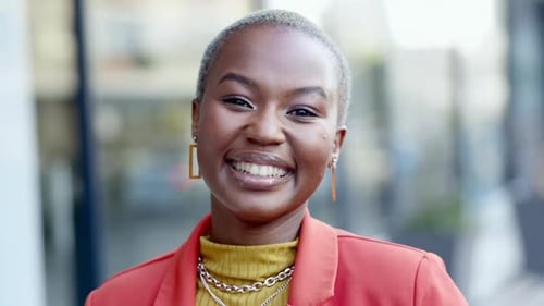 Happy, smile and face of black woman in city with a stylish, trendy and fashion outfit