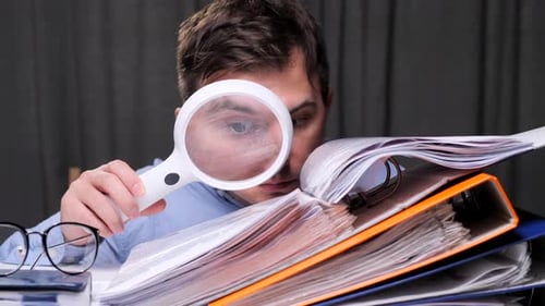 Accountant Examining Documents with Magnifying Glass Overworked Office Worker