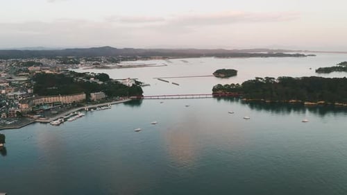 Aerial View Of Fukuurabashi Bridge In Matsushima, Miyagi District, Miyagi, Japan During Sunset - dro