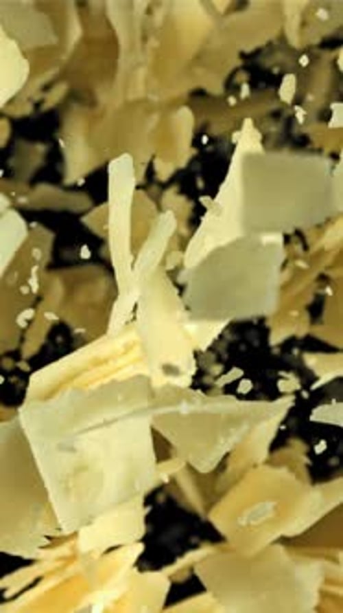 Parmesan Cheese Flies Up and Falls Down Filmed on a Highspeed Camera at 1000 Fps