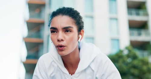 Fitness, breathing and tired woman in city for running, break or intense morning cardio routine