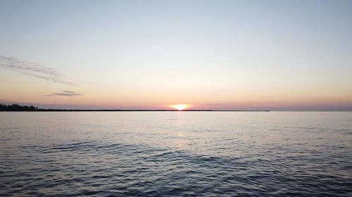 Beautiful vibrant high contrast sunset flyove over the Baltic sea at Liepaja Karosta war port Northe